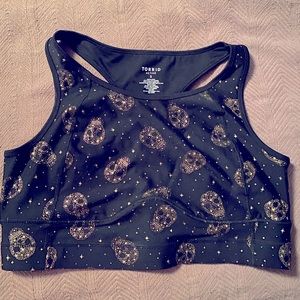 Gold skull black background longline torrid sports bra